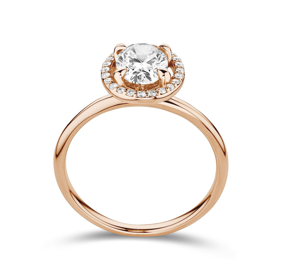 Halo emerald 1ct diamond ring