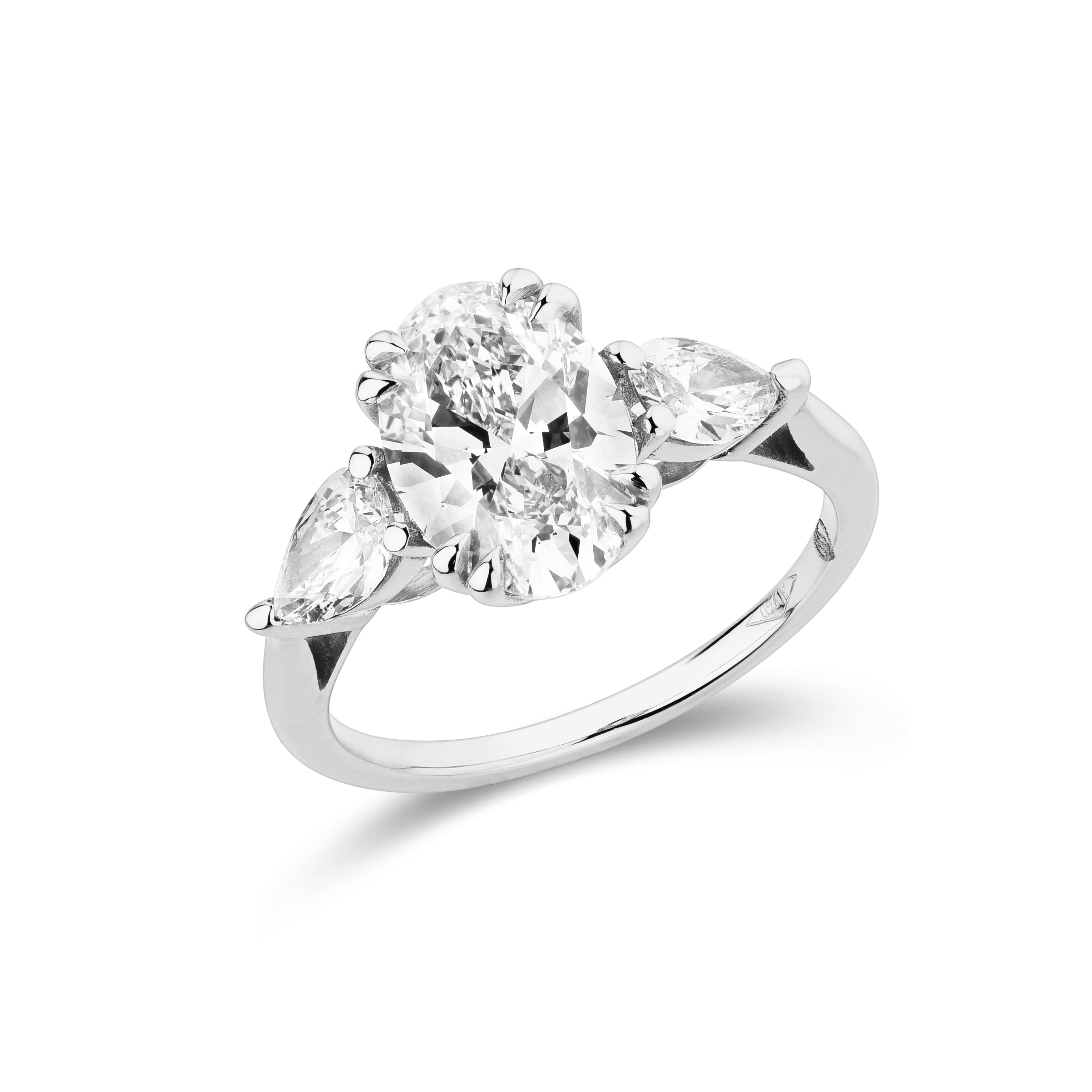 Oval and pear shape cut ring